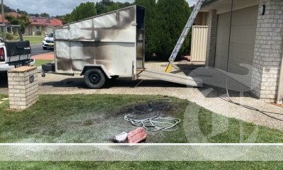 Tweed man suffers burns in trailer fire