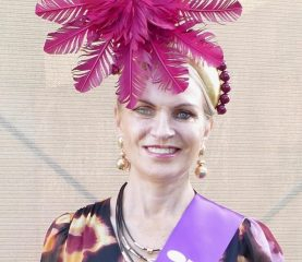 Women wearing a fancy hat at the Grafton cup