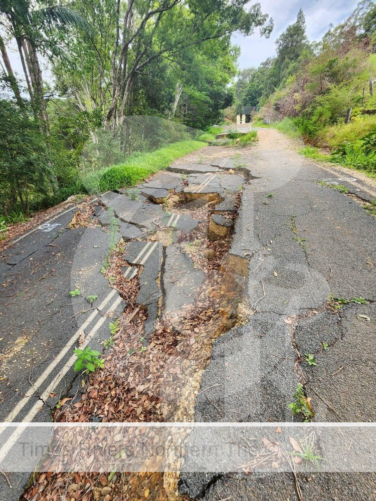 A crack in the road from the Tyalgum road extreme landslip.