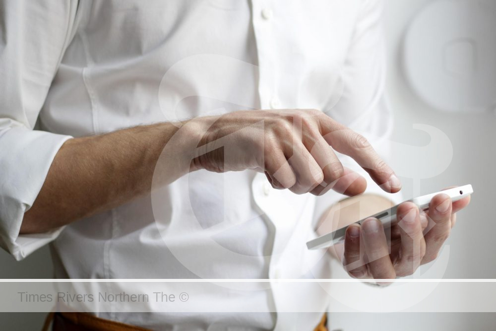 Person using a phone.