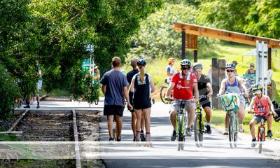 People ridding on the Northern Rivers Rail Trail.