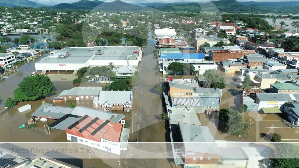 Aerial view of Murwillumbah in the 2022 flood, looking along Wollumbin Street.