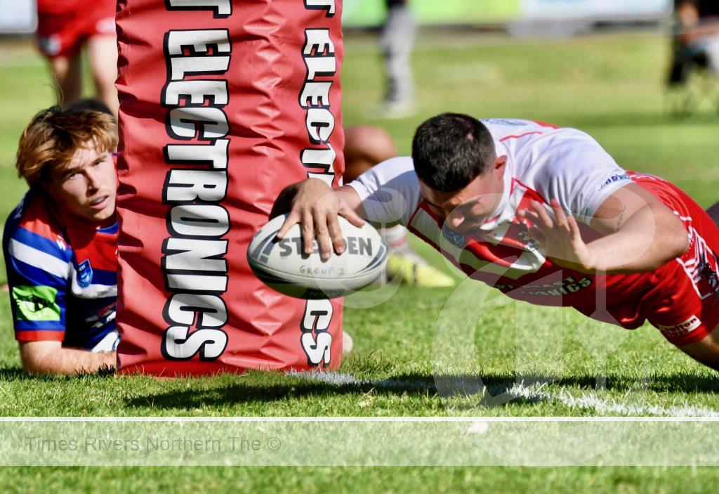 Rebels centre James Torrens dives over for a try in the preliminary final win over the Nambucca Rooster at McKittrick Park on Sunday. Photo: Gary Nichols.