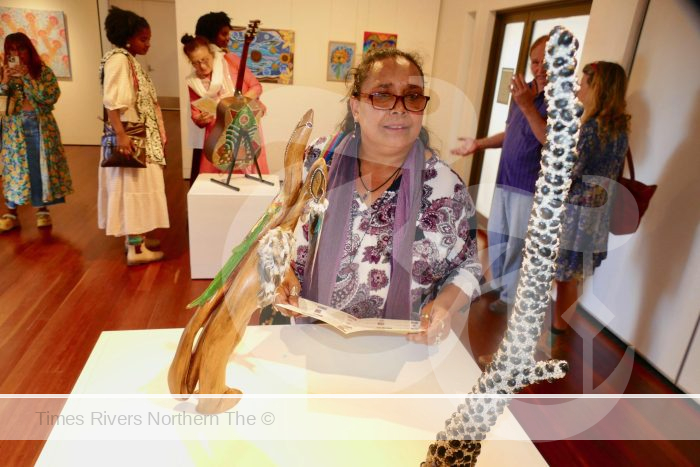 Grafton artist Dani Gorogo admiring some of the sculptural exhibits at the Clarence Valley Indigenous Art Awards on Saturday.