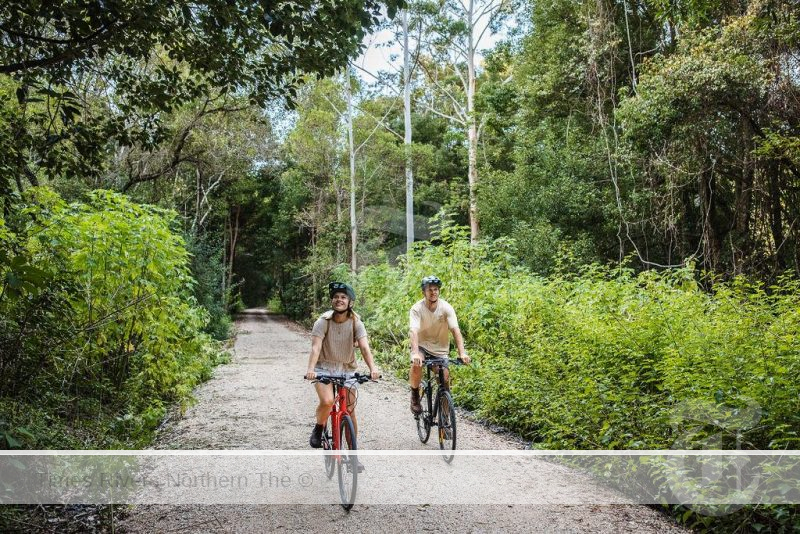 2 people riding bikes on the Northern Rivers Rail Trail.