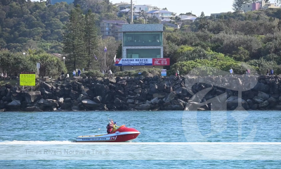 Ballina Jet Boat in the river in front of the marine rescue tower.