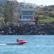 Ballina Jet Boat in the river in front of the marine rescue tower.