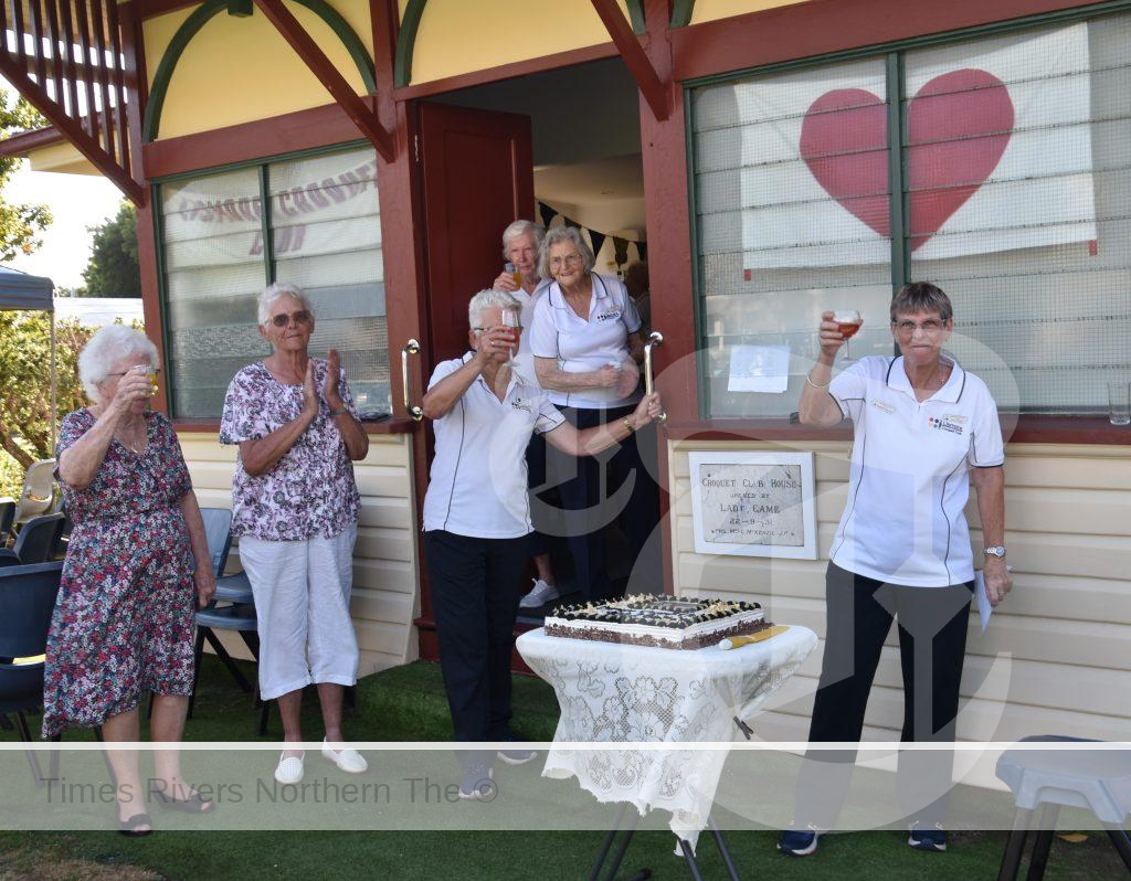 Toasting the reopening of the clubhouse and its 90+2 year birthday at the Lismore Croquet Club