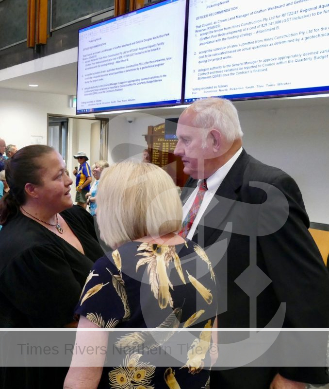 Regional Aquatic Centre actvist Karina Plunkett, left, and Cr Karen Toms speak with Cr Ian Tiley after the vote on September 26, to approve the almost $30 million tender for the project.