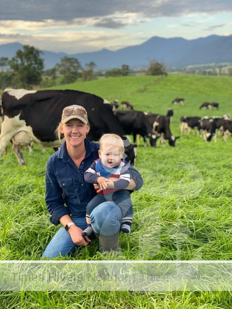 Dairy farmer Brodie Game from Blackjack Holsteins in the Bega Valley with her son. Brodie and her husband Kevin will talk to webinar participants about their RIC Farm Investment Loan.