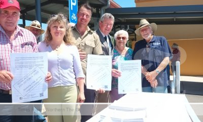 Armidale Train Station includes the petition. Left to right - Rob Lenehan, Karin Von Strockirch, Billy Wood, Mathew Tierney, Joy King. Tenterfield Trains