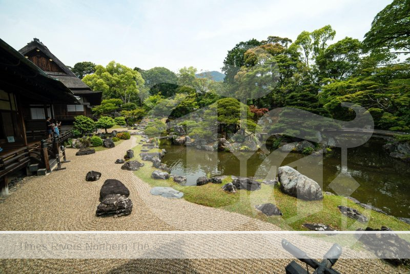 A Japanese garden design with a creek.