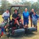 the Woodburn-Evans Head Golf Club receive a new piece of machinery to help keep their greens in top condition.