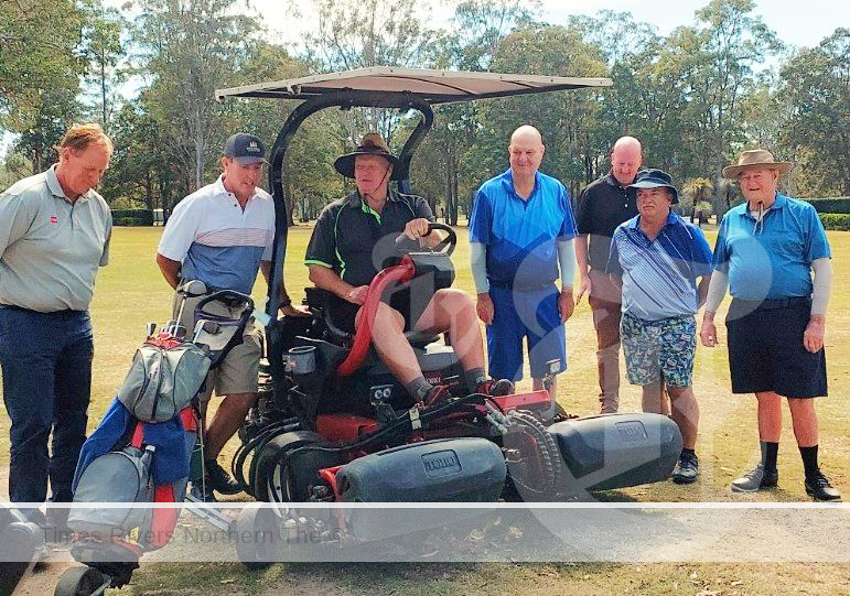the Woodburn-Evans Head Golf Club receive a new piece of machinery to help keep their greens in top condition.