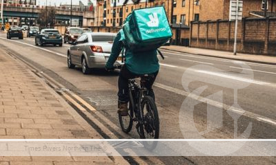 Gig economy, cost of living crisis and housing hostility. Young people ridding bikes