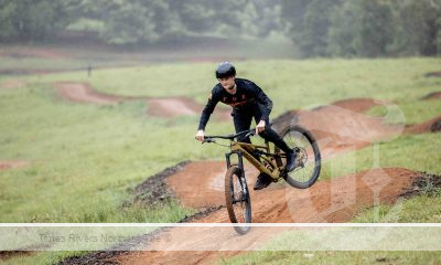 Semi-pro mountain bike rider Dane Folpp, 16, shows off his skills at the official opening of the Uki Mountain Bike Park last Saturday.
