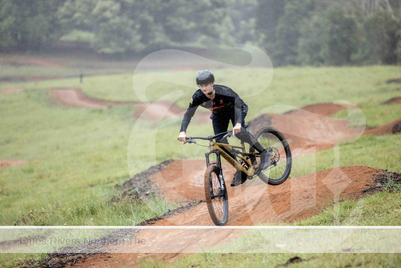 Semi-pro mountain bike rider Dane Folpp, 16, shows off his skills at the official opening of the Uki Mountain Bike Park last Saturday.