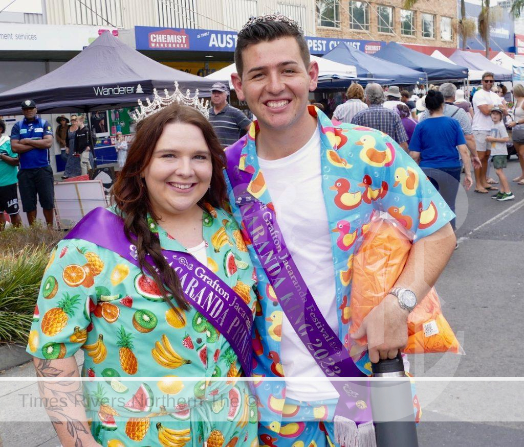 Newly crowned Jacaranda King Toby Power and Jacaranda Princess Tilly Sparrow out about about with their loyal "subjects" on Jacaranda Thursday.