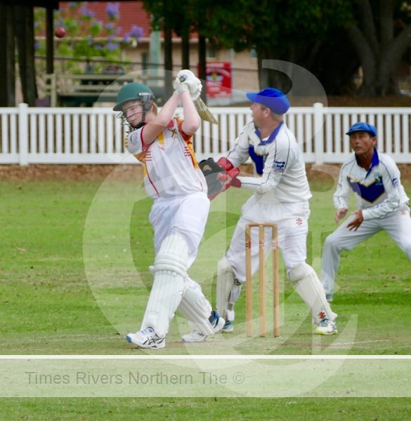 South Westlawn batter Riley Stanton aims a big drive at a Jake McMahon spinner but the ball sail safely off the outside edge for a couple of runs.