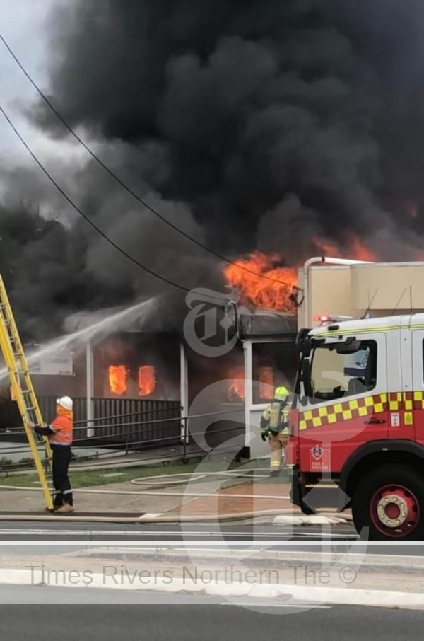 Firefighters battle a blaze which gutted the Clarence Valley Imaging building in River St, Maclean, on Thursday morning.