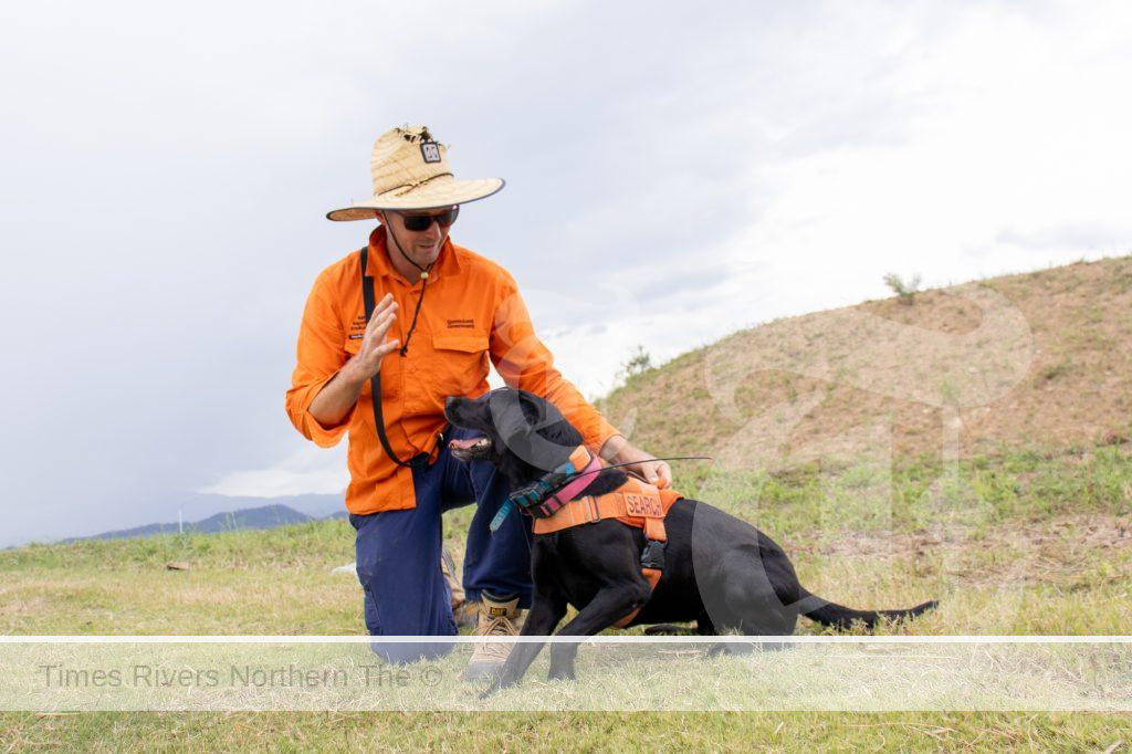 Dog detection handler Jordan Christison and his dog Miff from the National Fire Ant Eradication Program on the site where fire ants were identified in the new industrial estate at South Murwillumbah