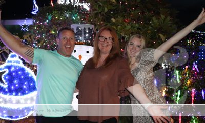 Pottsville residents, from left, Danny, Cherie and Stevie Brentnall have registered their Christmas house display on the Festive Glow Guide and are excited for others to join in the fun.