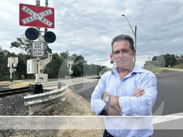 Paul Toole MP with Railway Crossing upgrades.