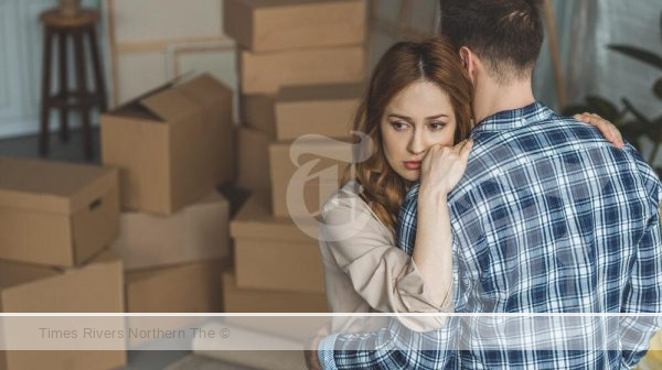 Couple hugging due to Rental stress