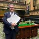 The Member for Clarence Richie Williamson in NSW Parliament with petitions containing 6000 signatures, to save the Ulmarra Ferry, which will be decommissioned on June 10.