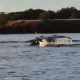 Fishermen captured footage of two humpback whales that swam into the Tweed River