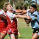 Woolgoolga centre Shayde Perham, pictured here during the 2023 grand final trying to fend off Rebels centre Jye Boehme, scored his team’s decisive try of the game in just the 24th minute of the match.