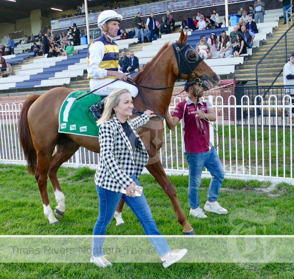 Part owner of South Grafton Cup winner Cepheus, Maree Anderson, leads him back past the grandstand after Sunday’s win. The former South Grafton woman has established a bond with the galloper, regularly travelling to Matt Dunn’s stable at Murwillumbah to check in on him.