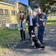 Lismore MP Janelle Saffin with North-Tracks Works Chair Patrick Higgins, Secretary/board member Kevin Bell and Mr Bell’s working dog Maezzie. - Youth Crime Prevention