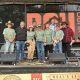 Richie Williamson is pictured with some of the hardworking organisers of the Glenreagh Timber Festival, his NSW Nationals colleagues, Gurmesh Singh and Michael Kemp and former The Voice Australia semi-finalist Mick Harrington (red & black flannie)