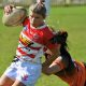 Redmen flyer Carla Dougherty proves more than a handful for the Kempsey defence as her team advanced to the grand final. Photo: Gary Nichols.