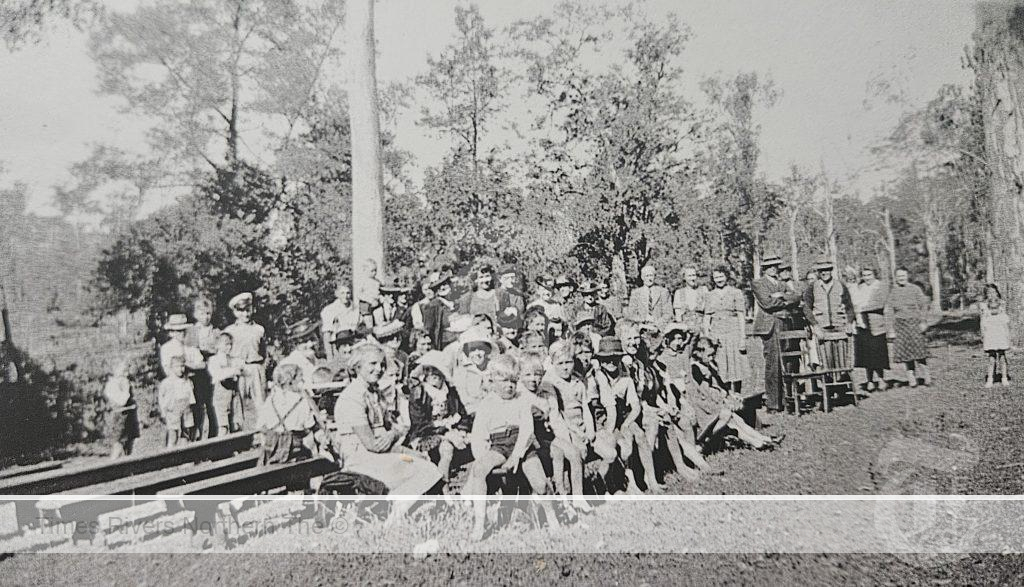 Gathering on a sports day outside Bottle Creek Hall - 1949